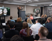 lady hosting subscriptions seminar