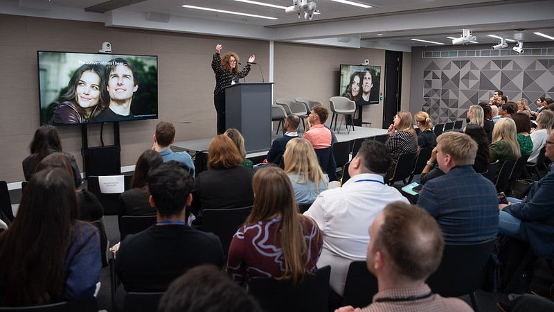 lady hosting subscriptions seminar